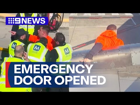 Man rips off emergency exit door and climbs onto wing of Jetstar plane | 9 News Australia