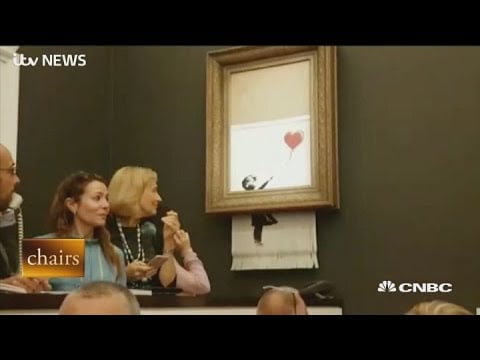 Banksy painting self shreds after being sold