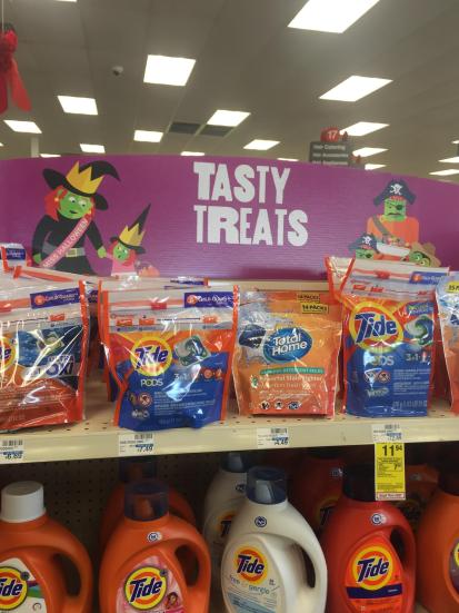 tasty treats signage in a store above tide pods dank memes