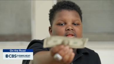 Boy, 9, awarded with free shopping spree after giving his only dollar to business owner he thought was homeless