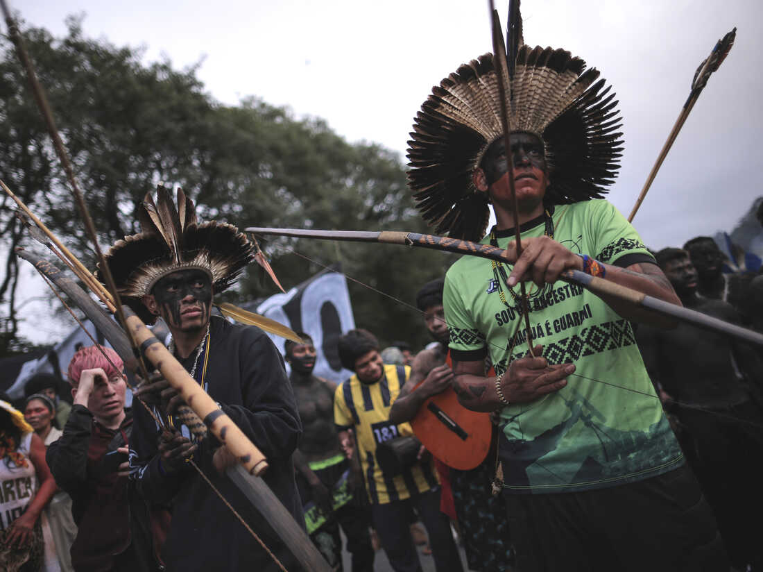 Indigenous people of Brazil protest as lawmakers vote to limit their land rights