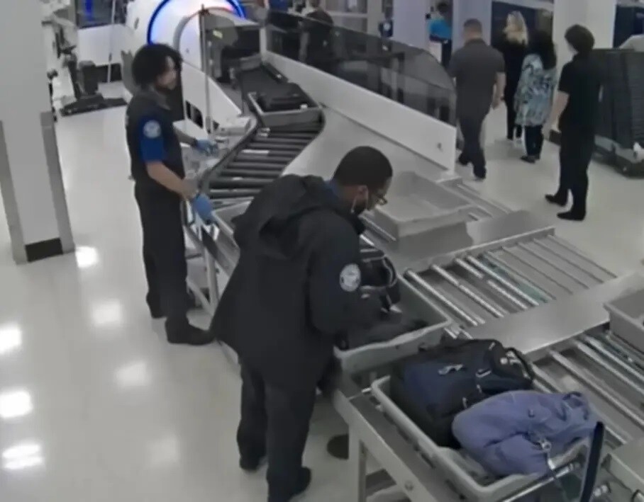 Newly released surveillance footage captures alleged theft by TSA officers at Florida airport