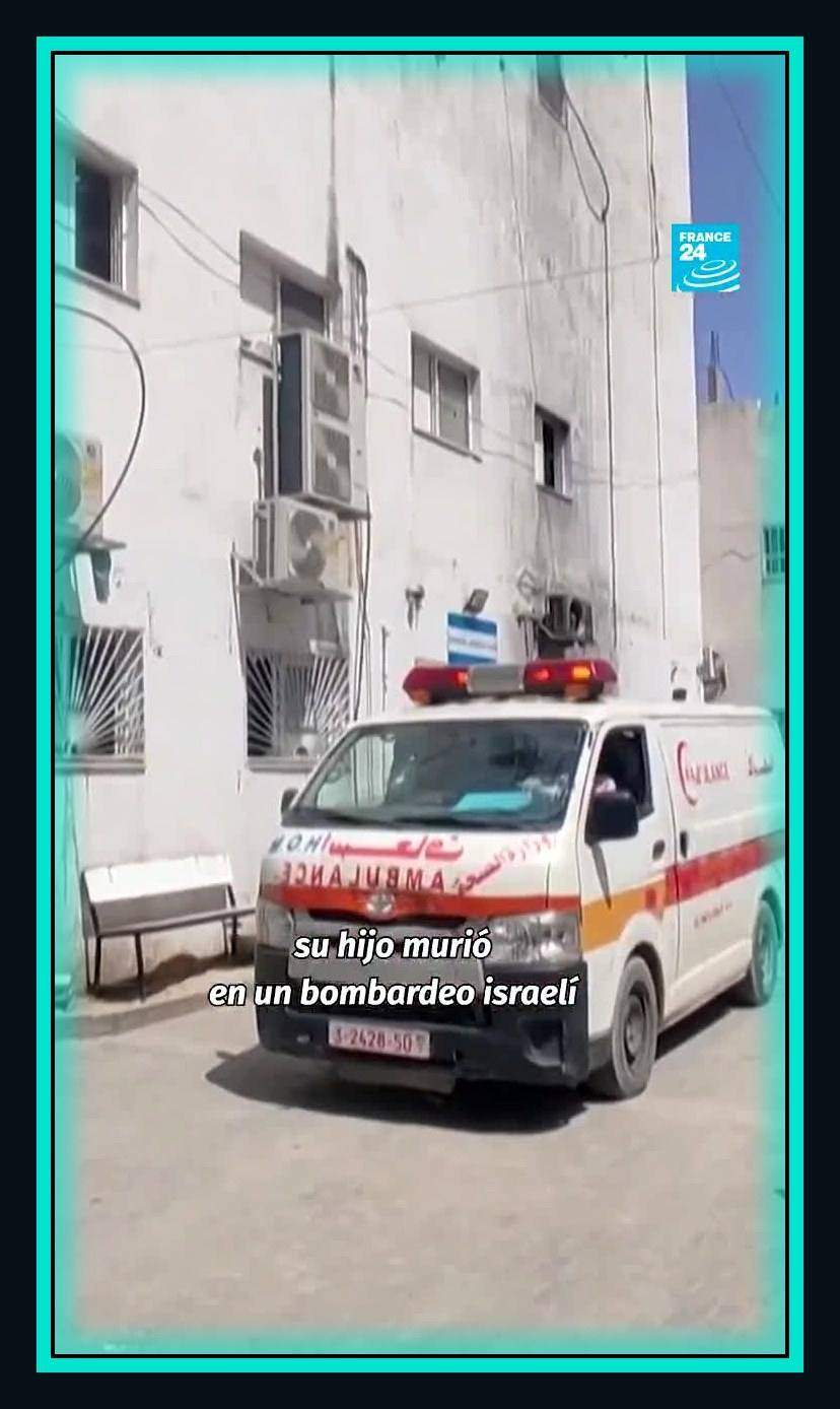 A Gaza ambulance parked outside a damaged clinic in a video frame noting that Dr Hussam Abu Safiya son was killed in an Israeli bombardment
