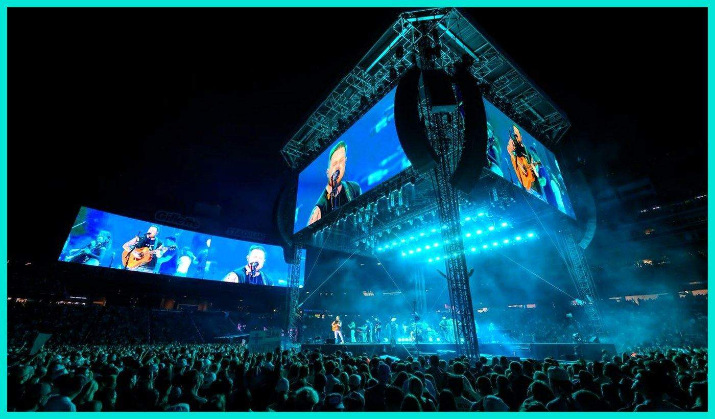 Zach Bryan stage at the Gillette Stadium record show Gillette Stadium stage screens and crowd on the night Zach Bryan set the attendance record